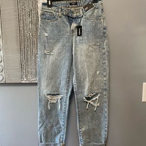 NWT . Light wash mid rise boyfriend jeans